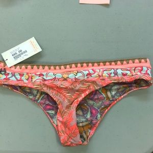 Never worn, maaji swim bottoms in size medium